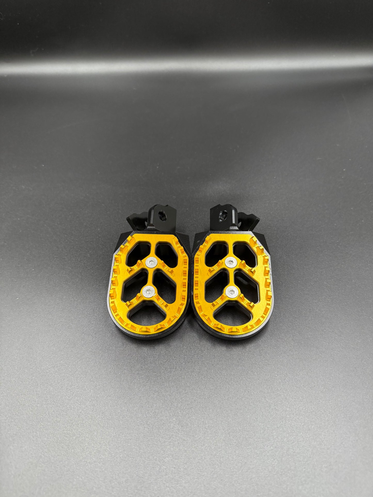 Surron Light Bee New-Style FootPegs in Yellow/Gold