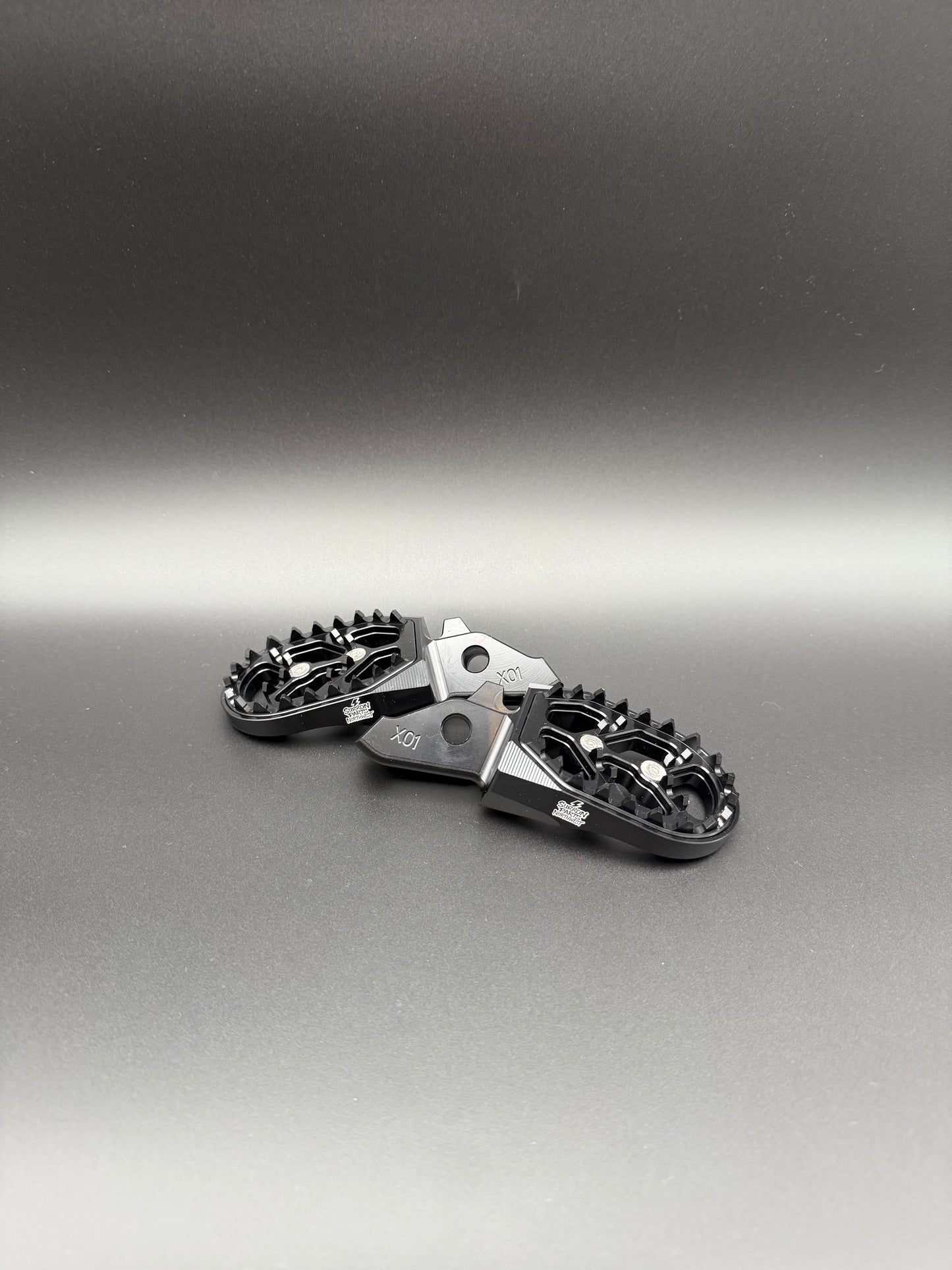 Surron Ultra Bee Footpegs in Black