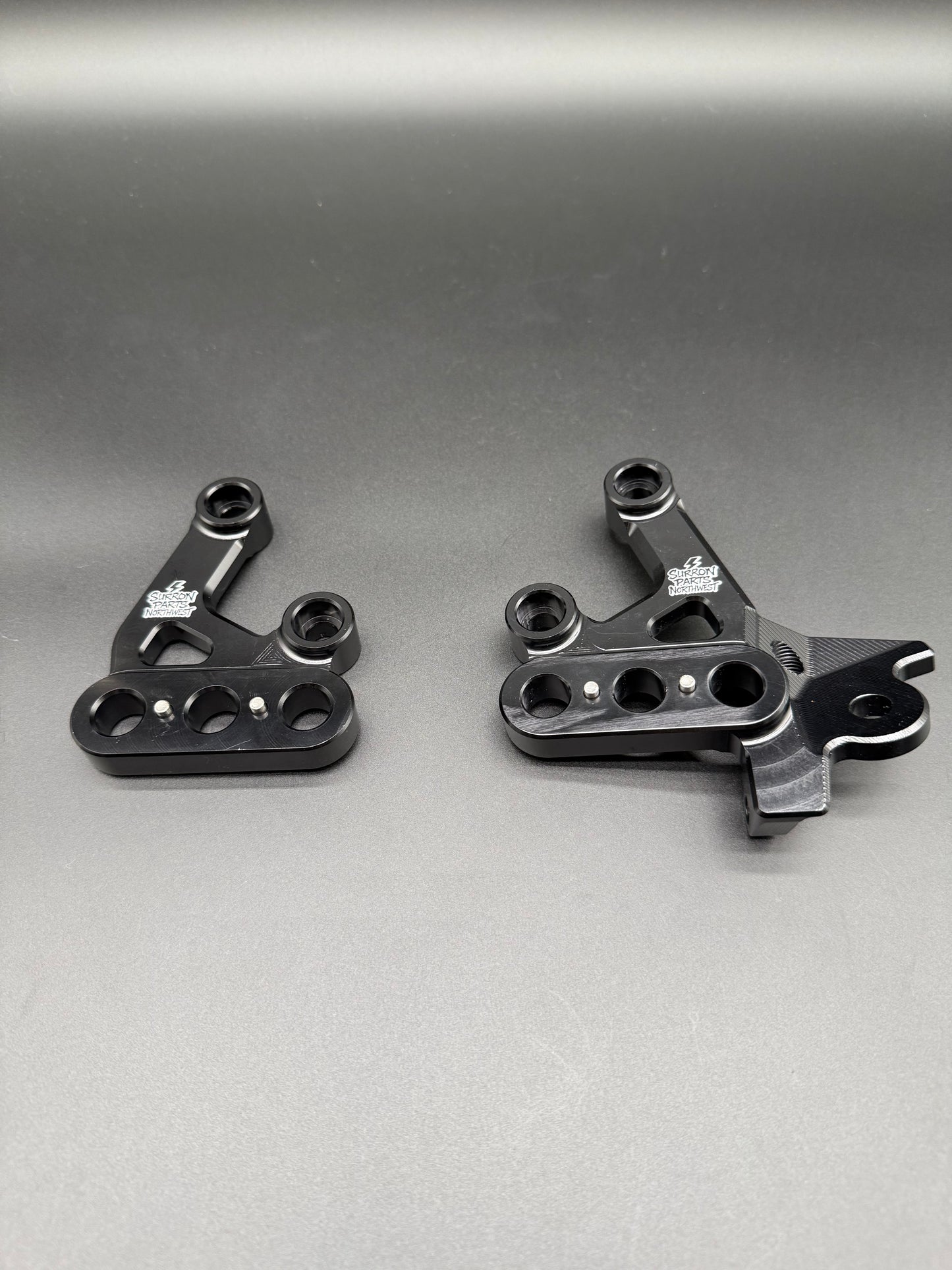 Surron Light Bee Peg Bracket Hanger Pair in Black