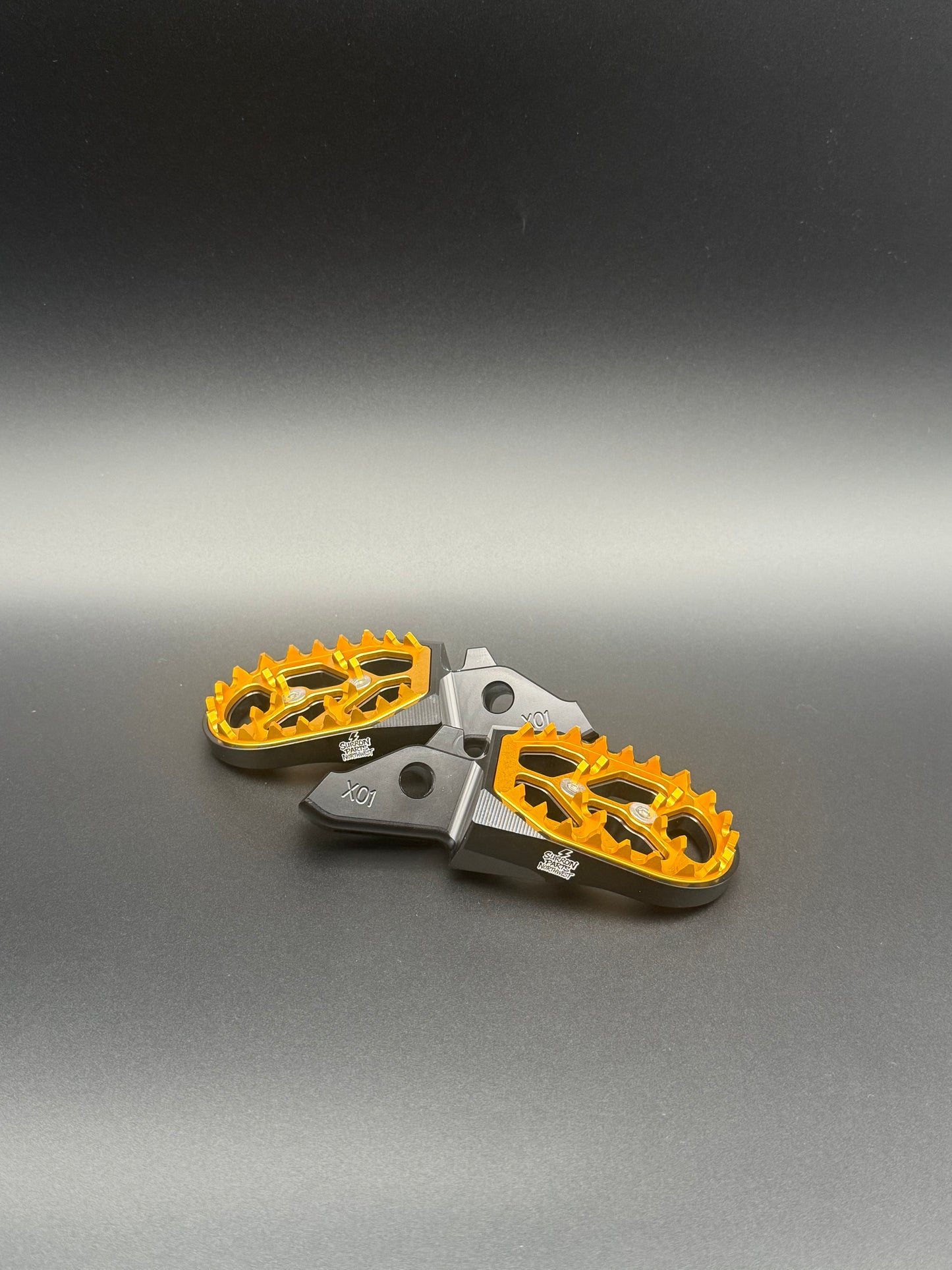 Surron Ultra Bee Footpegs in Gold/Yellow